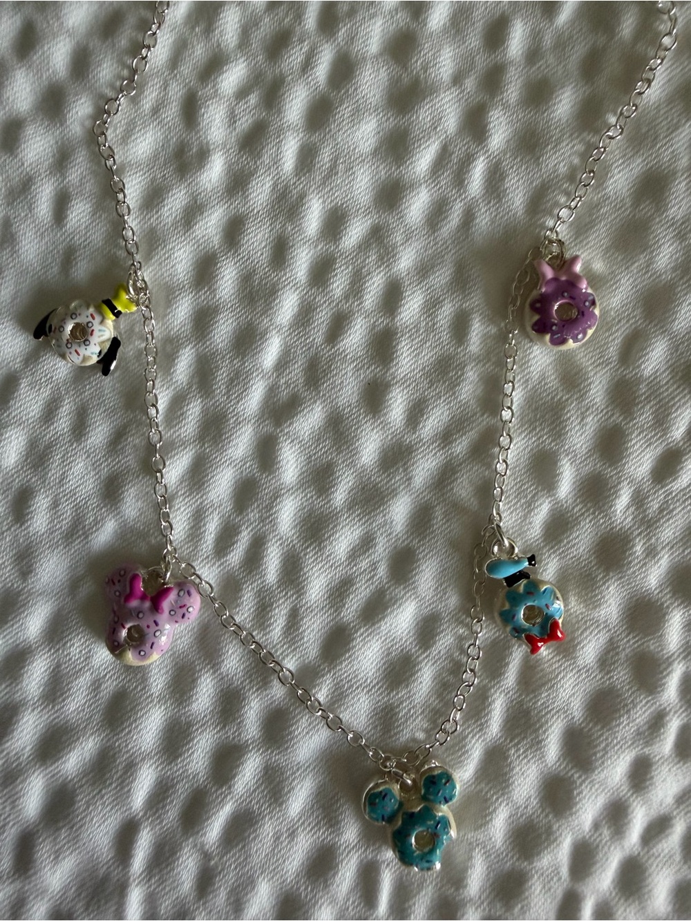 Disney parks Silver Necklace with character Donut Charms